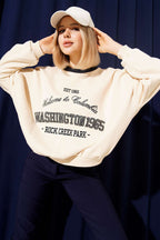 https://cdn.pazarium.com.tr/yazi-nakisli-oversize-sweatshirt-bej-737094-17-B.jpg