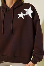 https://cdn.pazarium.com.tr/yildiz-baskili-kapusonlu-sardonlu-sweat-kahve-700380-16-B.jpg