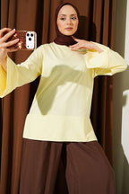 https://cdn.pazarium.com.tr/yirtmac-detayli-genis-kollu-tunik-sari-797186-19-B.jpg