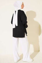 https://cdn.pazarium.com.tr/yirtmac-detayli-modal-tunik-siyah-826411-20-B.jpg