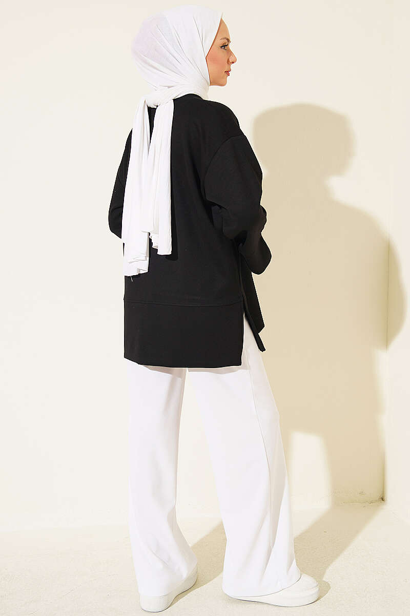 https://cdn.pazarium.com.tr/yirtmac-detayli-modal-tunik-siyah-826411-20-B.jpg