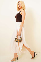 https://cdn.pazarium.com.tr/yirtmac-detayli-salvar-pantolon-bej-803444-19-B.jpg