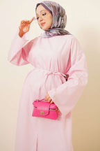 https://cdn.pazarium.com.tr/yirtmacli-ip-kusakli-uzun-tunik-pembe-803622-19-B.jpg