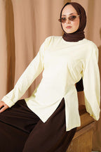 https://cdn.pazarium.com.tr/yirtmacli-yanlari-ip-bagcikli-tunik-sari-804543-19-B.jpg