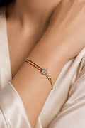 https://cdn.pazarium.com.tr/yonca-mini-tasli-bileklik-gold-811101-20-B.jpg