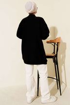 https://cdn.pazarium.com.tr/zigzag-orgu-triko-tunik-siyah-693648-16-B.jpg